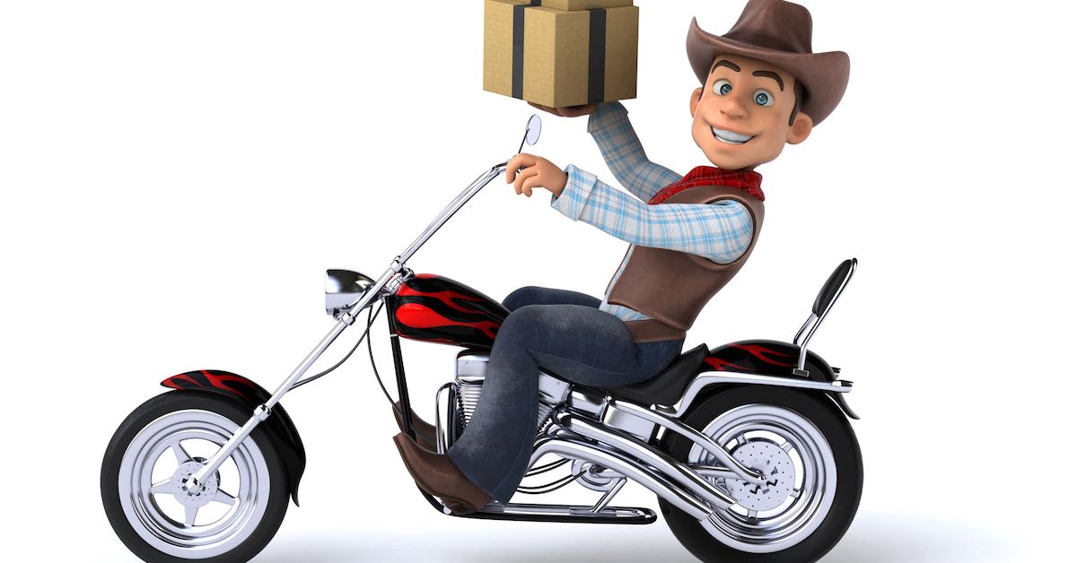 fun cowboy holding moving box