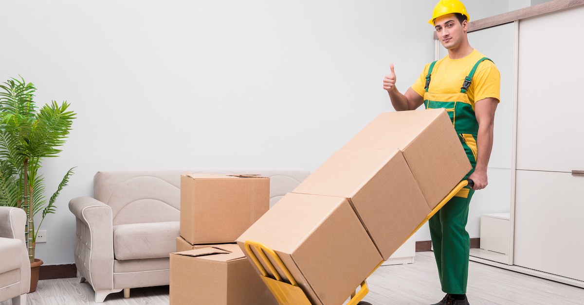 Man-delivering-boxes-during-house-move