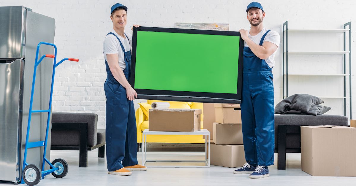 two-movers-holding-tv