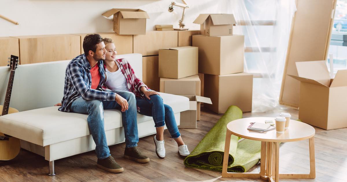 Couple resting in new house